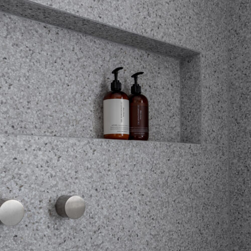 Wall niche with mitred edges in grey terrazzo tile in our Balwyn bathroom renovation