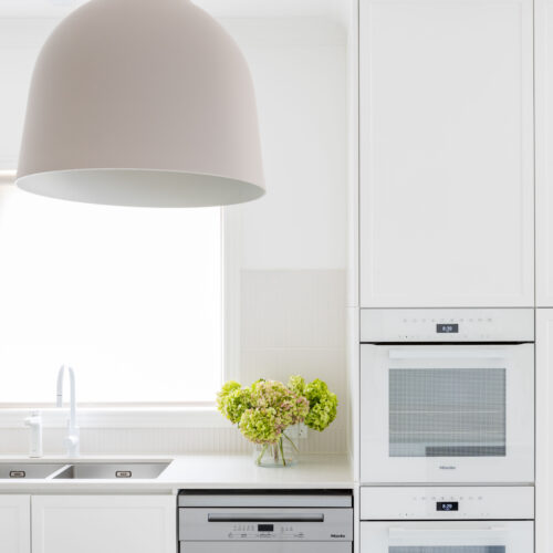 White Miele ovens against white shaker style joinery in our Balwyn kitchen renovation